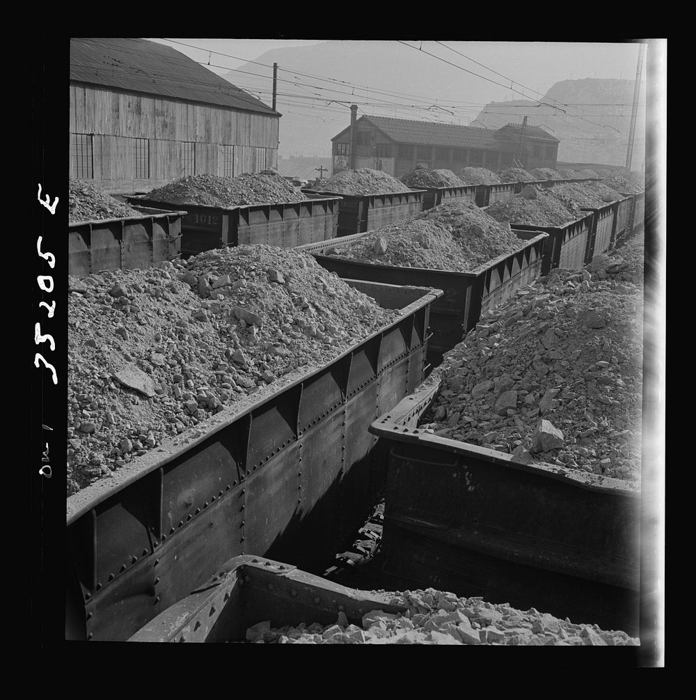 [Untitled photo, possibly related to: Trains of ore containing copper arriving at one of the large refining plants of the…