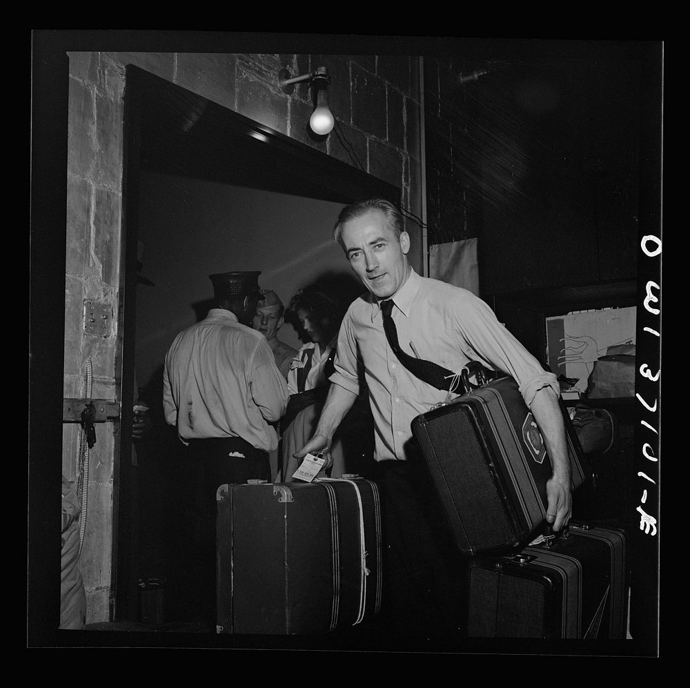 [Untitled photo, possibly related to: Pittsburgh, Pennsylvania. Passengers checking their bags at the Greyhound bus…