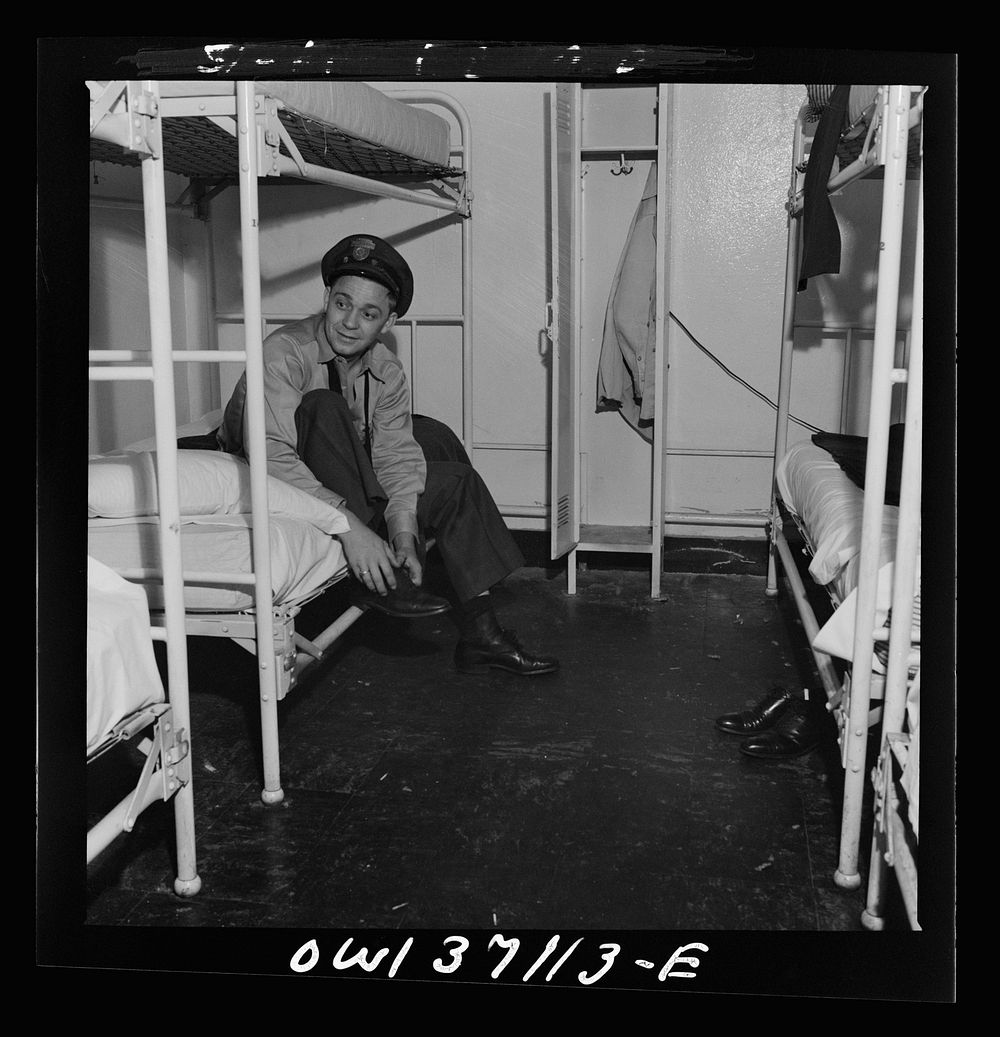 Pittsburgh, Pennsylvania. A Greyhound bus driver dressing in dormitory at the garage. This is for the use of drivers living…