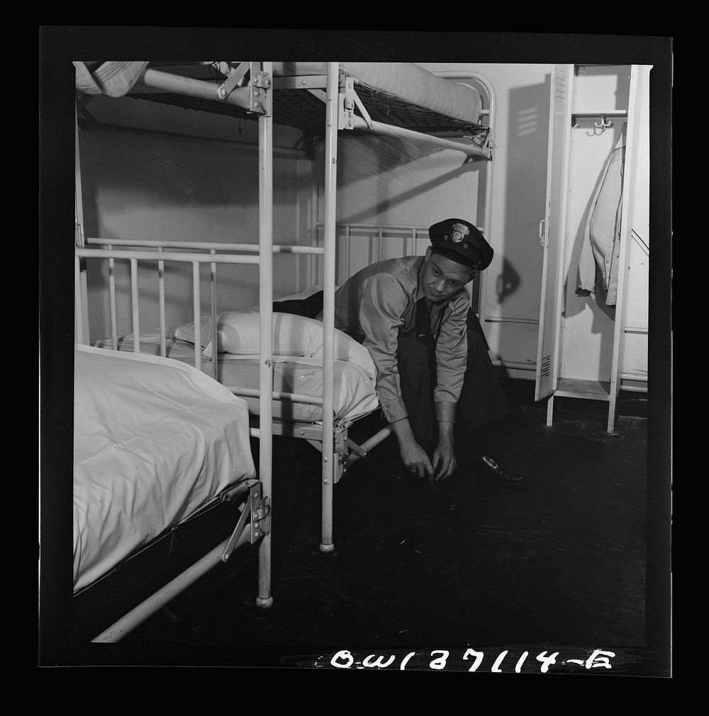 [Untitled photo, possibly related to: Pittsburgh, Pennsylvania. A Greyhound bus driver dressing in dormitory at the garage.…