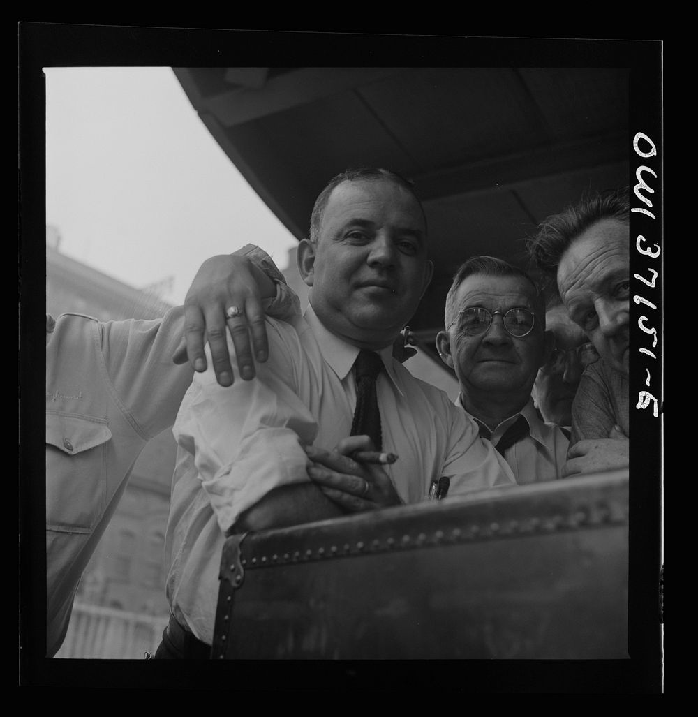 [Untitled photo, possibly related to: Pittsburgh, Pennsylvania. Baggage agents at the Greyhound bus terminal]. Sourced from…