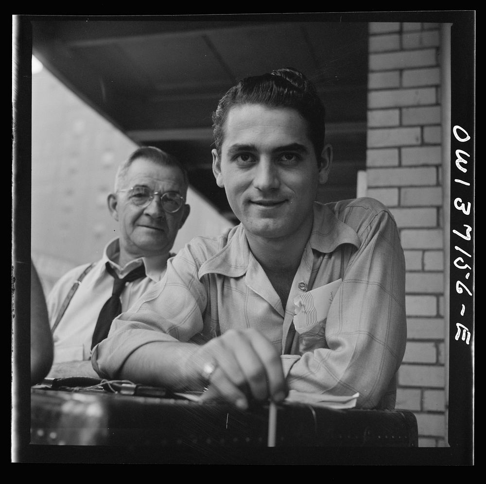 [Untitled photo, possibly related to: Pittsburgh, Pennsylvania. Baggage agents at the Greyhound bus terminal]. Sourced from…