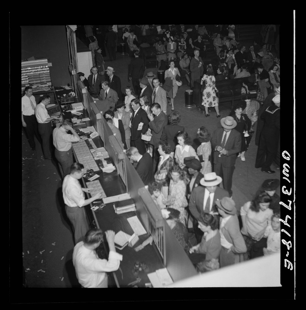 [Untitled photo, possibly related to: Pittsburgh, Pennsylvania. A crowd buying tickets at the Greyhound bus terminal].…