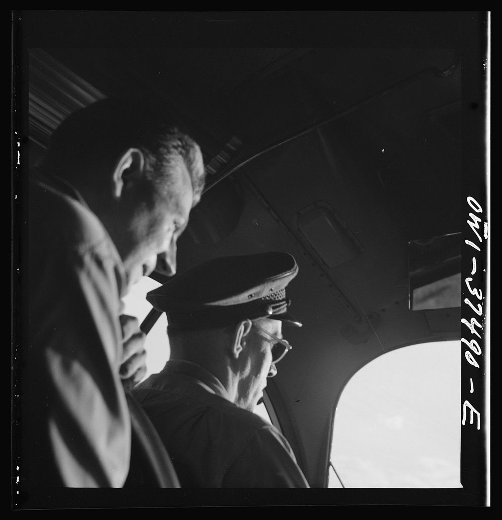 Bus driver and passenger enroute from Columbus to Cincinnati, Ohio. Sourced from the Library of Congress.