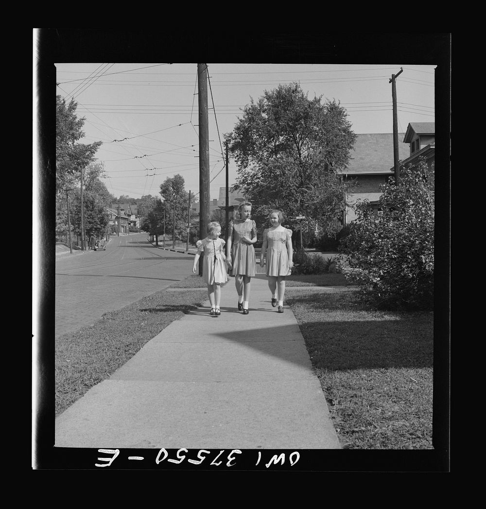 [Untitled photo, possibly related to: Cincinnati, Ohio. The Cochran children on the way from Sunday school]. Sourced from…
