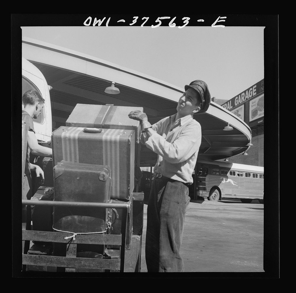 Cincinnati, Ohio. Loading baggage on a Greyhound bus at the bus terminal. Sourced from the Library of Congress.