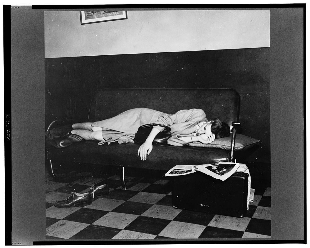Chicago, Illinois. A girl who is waiting between buses in the ladies' lounge at four a.m. in the Greyhound bus terminal.…