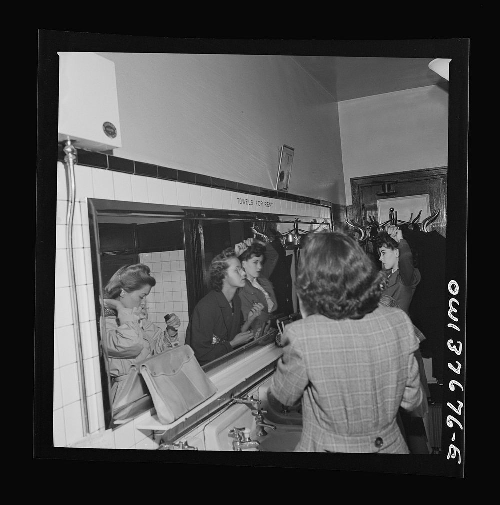 [Untitled photo, possibly related to: Chicago, Illinois. Passengers freshening up in the ladies' restroom at the Greyhound…