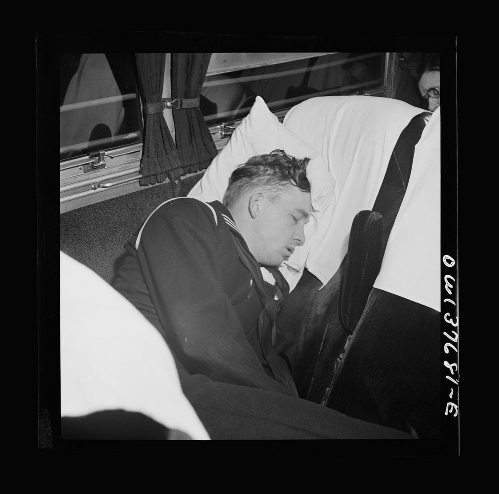 Passengers on a Greyhound bus bound for Chicago, Illinois from Cincinnati, Ohio at two a.m.. Sourced from the Library of…
