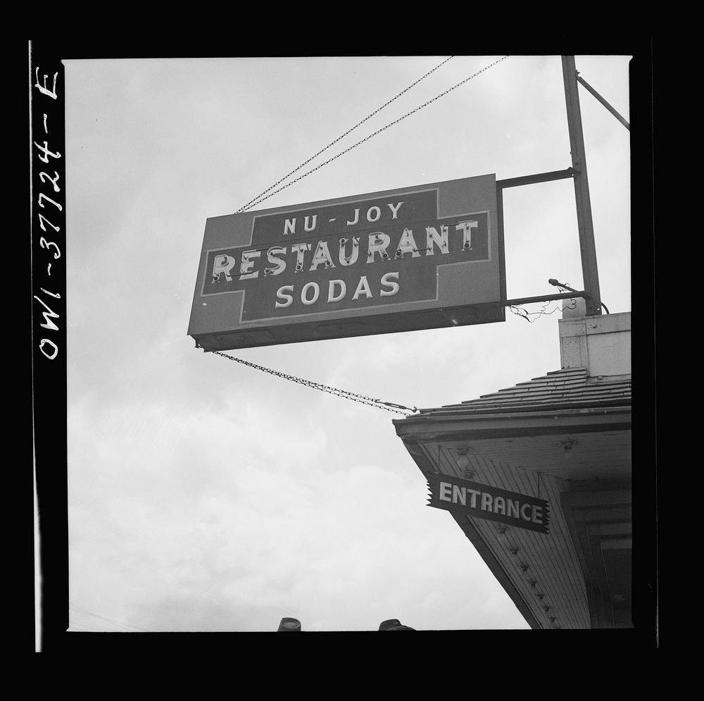 A restaurant sign on the bus route through Indiana to Chicago. Sourced from the Library of Congress.