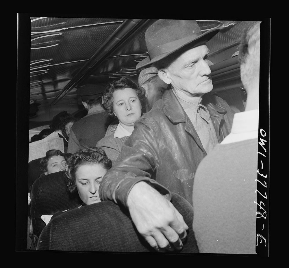 Passengers on a Greyhound bus going from Chicago, Illinois to Cincinnati, Ohio. Most of the standing passengers are local…