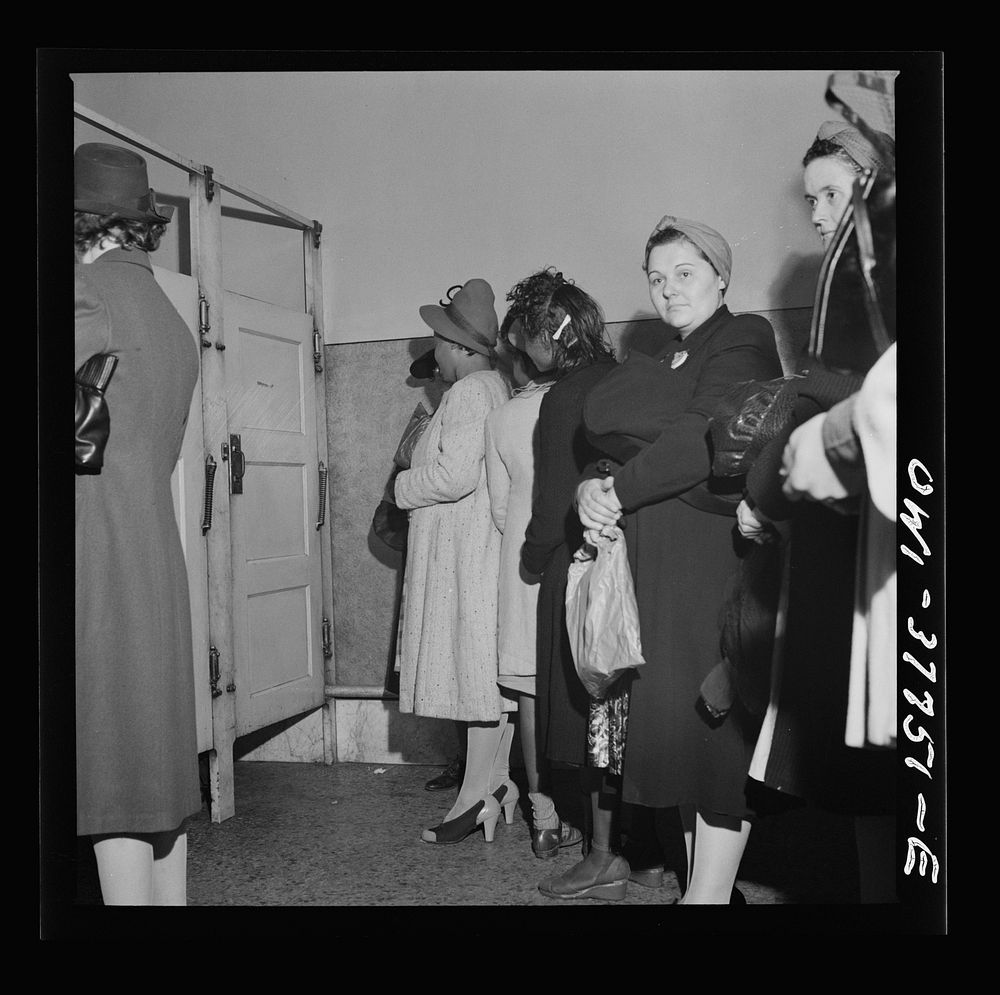 Indianapolis, Indiana. Bus passengers waiting in line to use the free toilet in the ladies' restroom at the Greyhound bus…