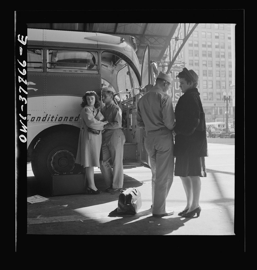 Indianapolis, Indiana. A soldier and a girl saying goodbye at the Greyhound bus station. Sourced from the Library of…