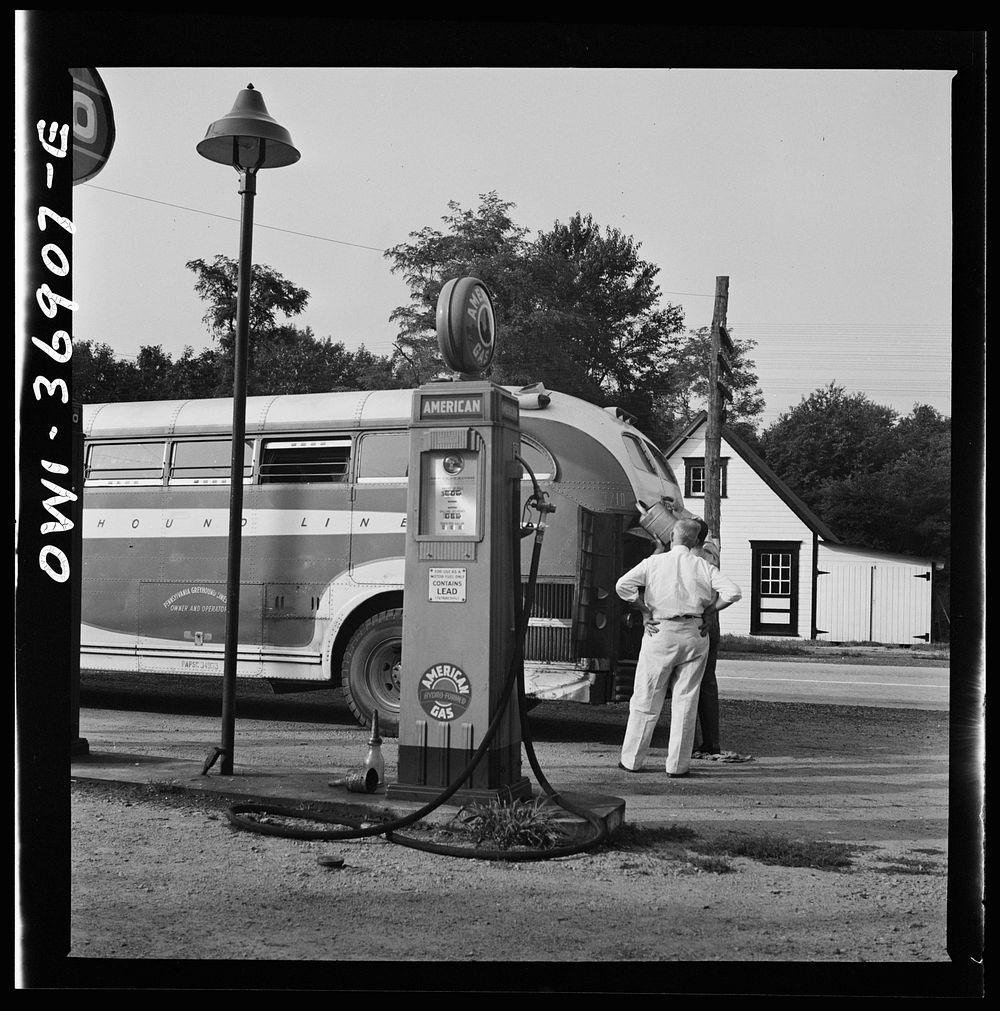 A Greyhound bus that has been stopped at a filling station to get water between Washington, D.C. and Pittsburgh…