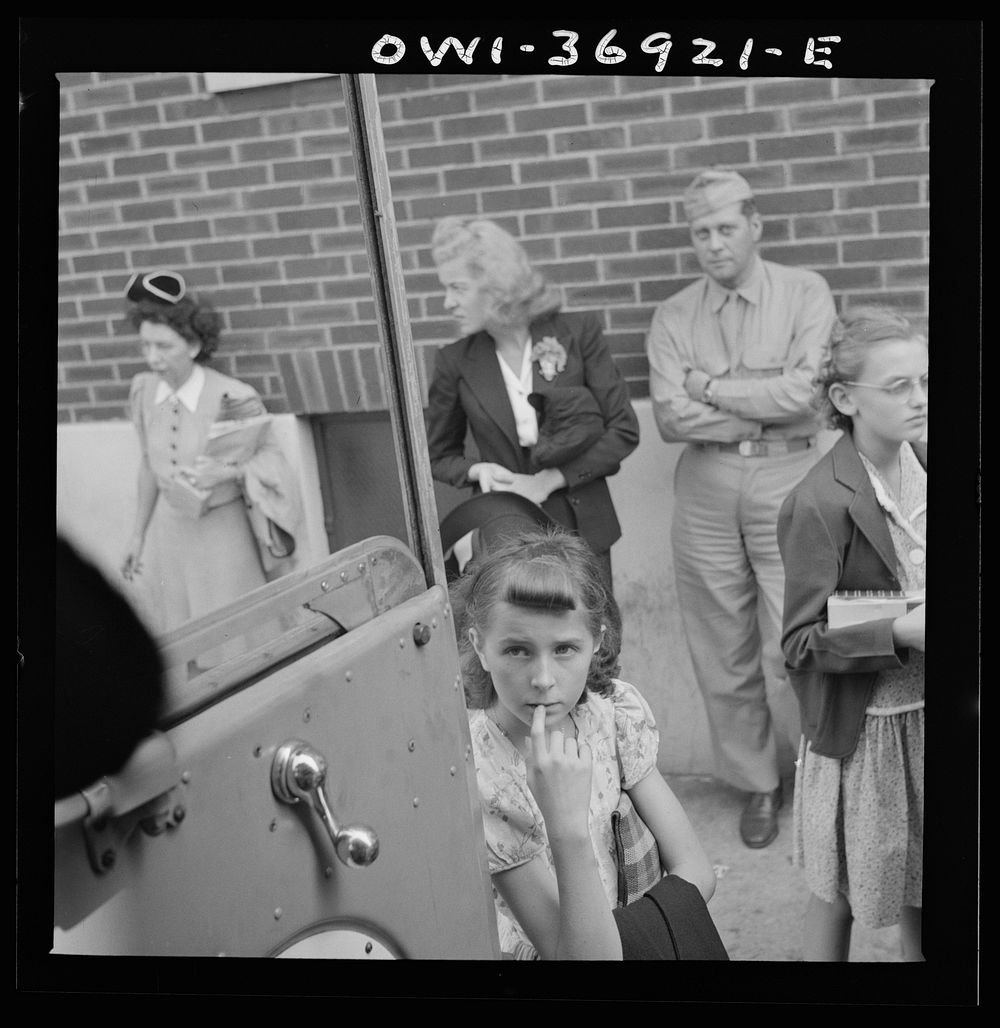 Passengers waiting for a Greyhound bus driver to start loading them on the bus at a small town in Pennsylvania. Sourced from…
