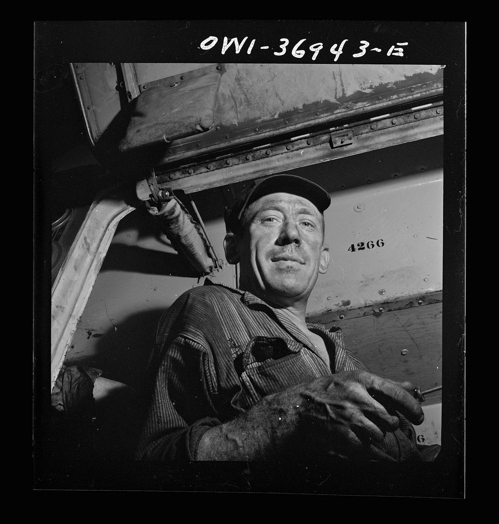 Pittsburgh, Pennsylvania. A mechanic at the Greyhound garage. Sourced from the Library of Congress.