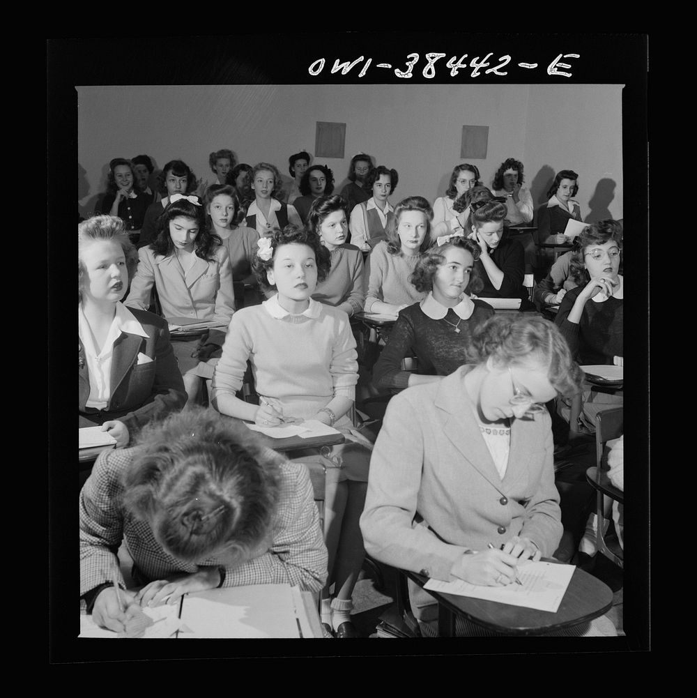 Washington, D.C. Writing a test in a health education class at Woodrow Wilson High School. Sourced from the Library of…