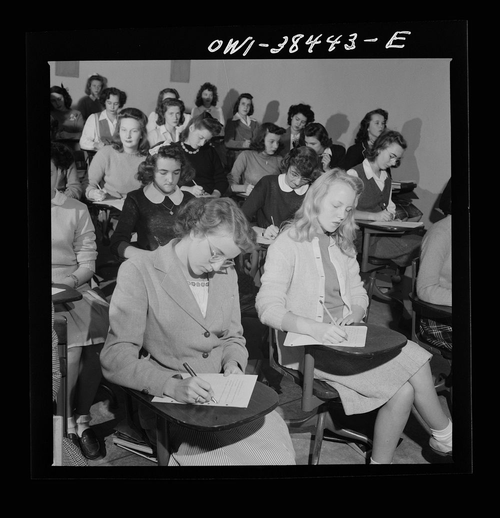 Washington, D.C. Writing a test in a health education class at Woodrow Wilson High School. Sourced from the Library of…