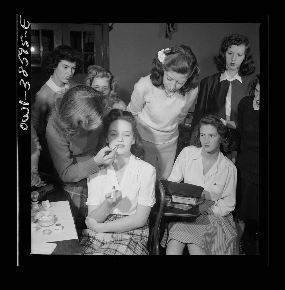 Washington, D.C. A demonstration of the correct procedure in applying street makeup in a home management class at Woodrow…