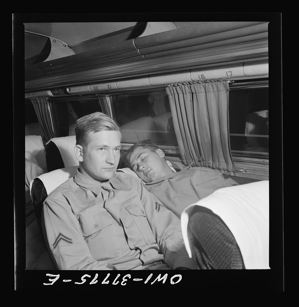 A soldier sleeping on the way from Cincinnati, Ohio to Louisville, Kentucky on a Greyhound bus. Sourced from the Library of…