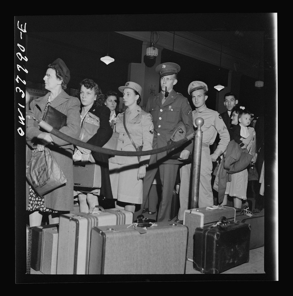 Chicago, Illinois. Passengers waiting for a bus to start loading at the Greyhound bus terminal. Sourced from the Library of…