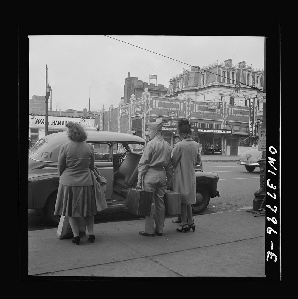 Chicago, Illinois. People waiting outside the Greyhound bus terminal. Sourced from the Library of Congress.
