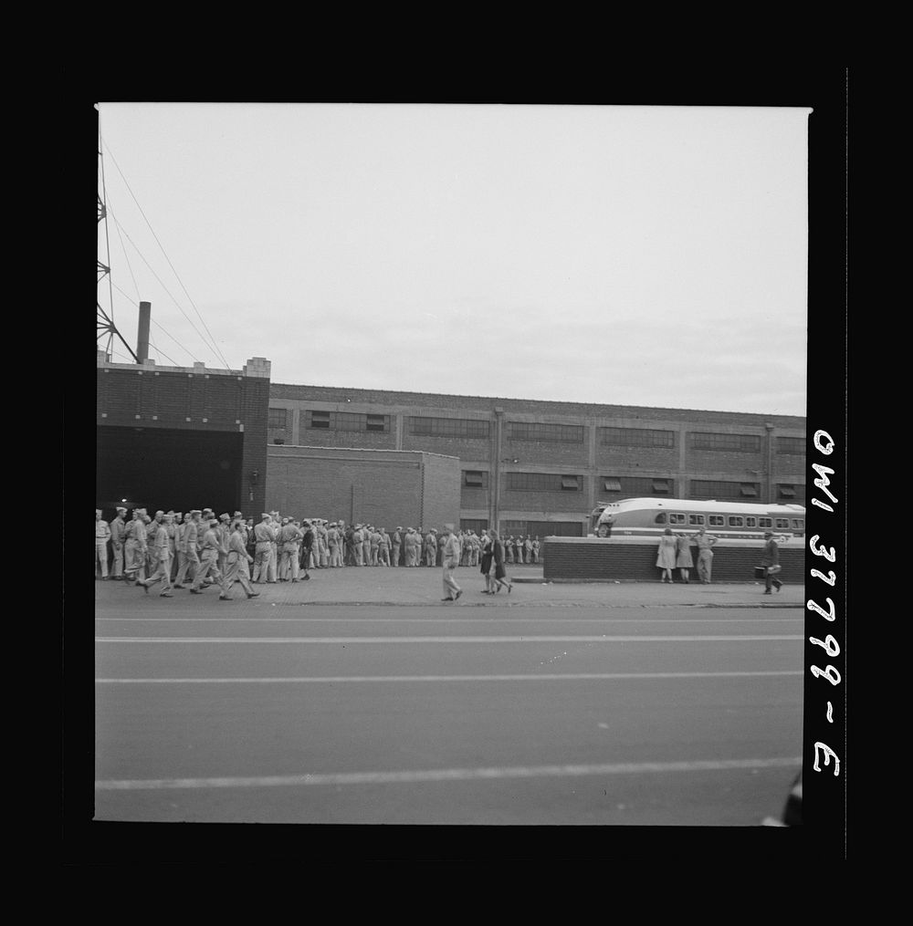 Louisville, Kentucky. Part of a line of soldiers waiting for Fort Knox bus at the Greyhound bus station. Sourced from the…