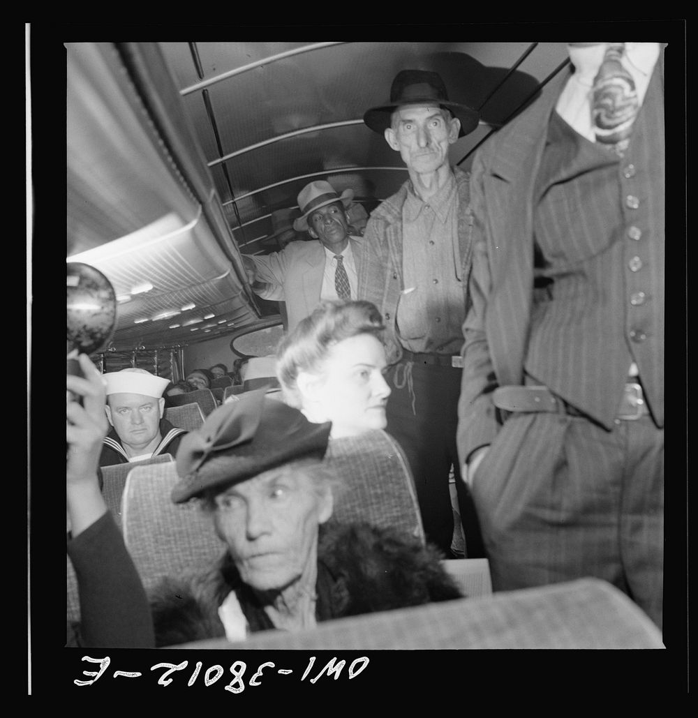 A Greyhound bus trip from Louisville, Kentucky, to Memphis, Tennessee, and the terminals. Passengers standing in aisles on…