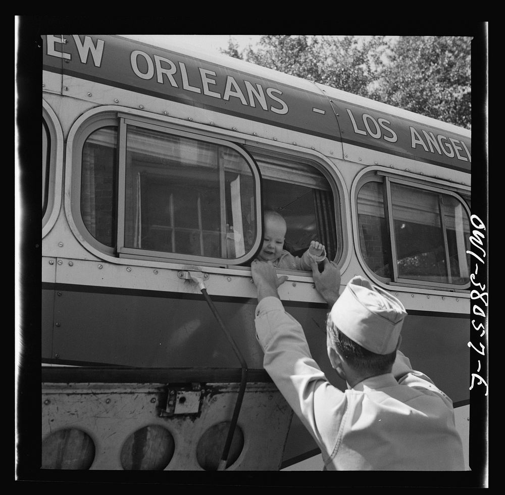 Bus trip from Knoxville, Tennessee to Washington, D.C. Soldier saying goodbye to his wife and child at small town in…