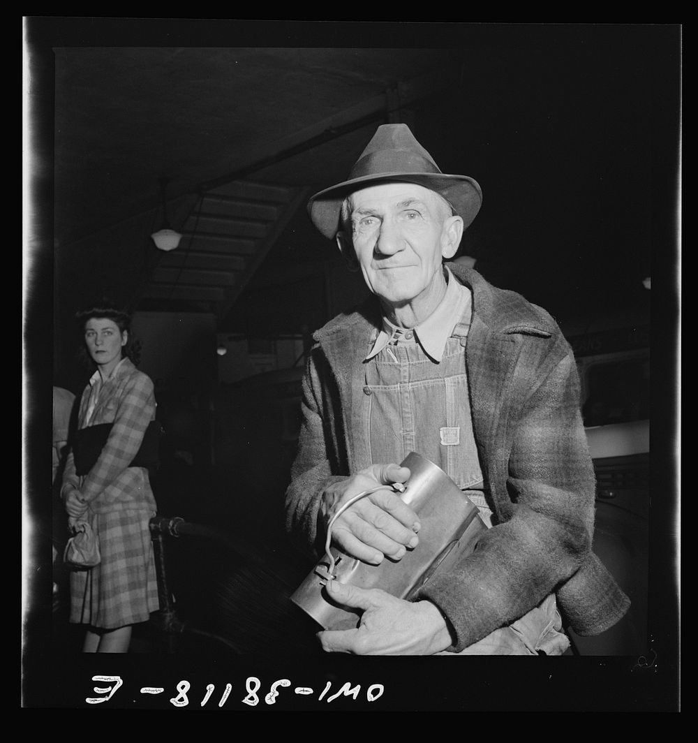 Bus trip from Knoxville, Tennessee, to Washington, D.C. Workman waiting for bus at Knoxville, Tennessee. Sourced from the…