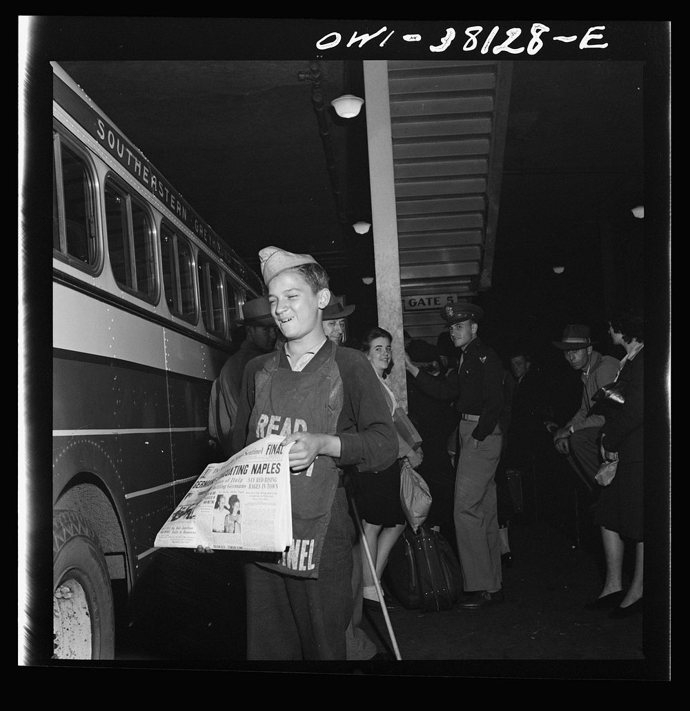 Bus trip from Knoxville, Tennessee, to Washington, D.C. Newsboy at Knoxville bus terminal. Sourced from the Library of…
