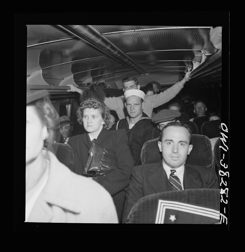 Passengers standing on a bus enroute from Roanoke, Virginia to Washington, D.C.. Sourced from the Library of Congress.