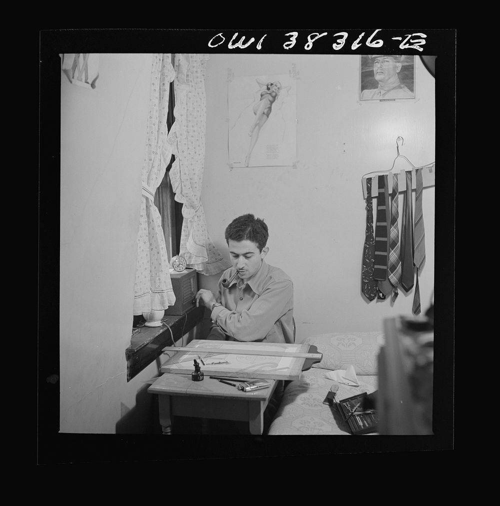 Washington, D.C. This employee of the U.S. Navy Department listens to the radio and studies drafting in his boardinghouse…