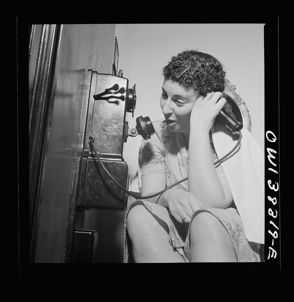 Washington, D.C. The telephone in a boardinghouse is always busy. Sourced from the Library of Congress.