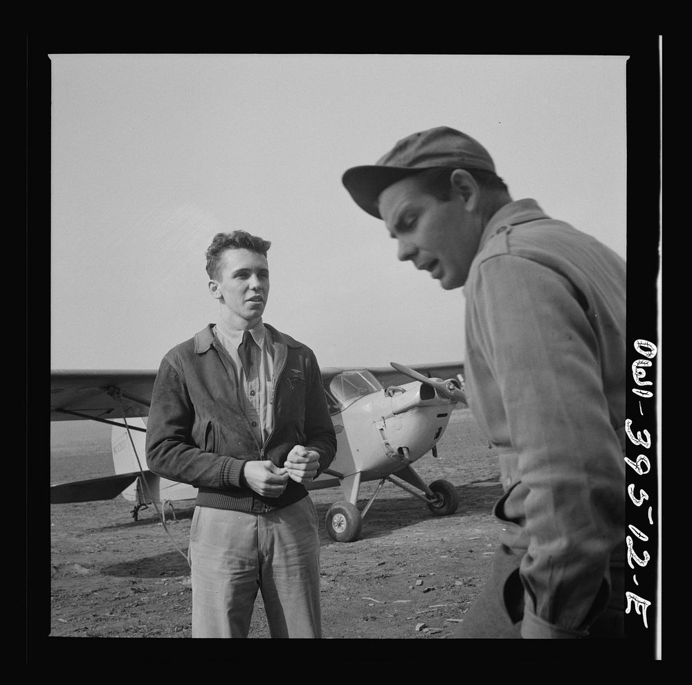 Frederick, Maryland. After a solo flight, Walter Spangenberg, a student at Woodrow Wilson High School, listens to a…