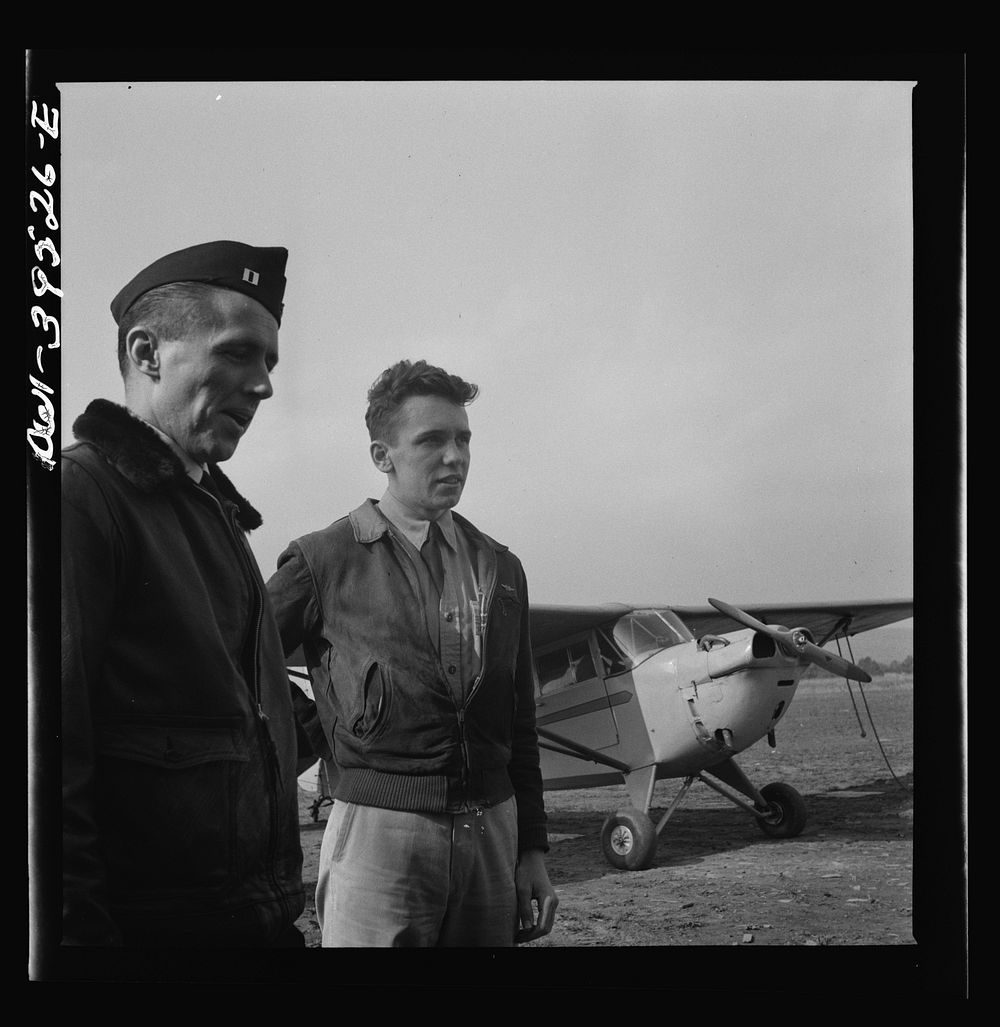 Frederick, Maryland. Walter Spangenberg, a student at Woodrow Wilson High School, and a friend at the Stevens Airport.…
