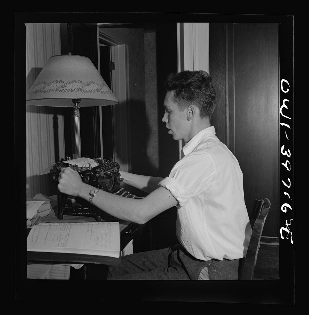 Washington, D.C. Walter Spangenberg, a student at Woodrow Wilson High School, doing his school work at home. Sourced from…