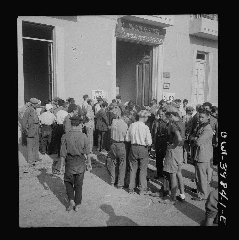 Messina, Sicily. Workers outside the labor office where both skilled and unskilled are given assignments for the day.…