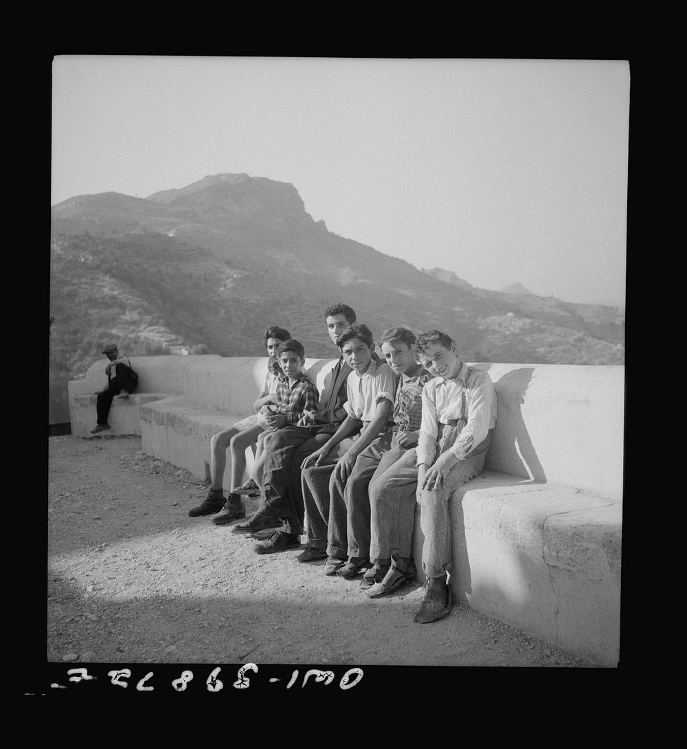 Castel Mola (vicinity), Sicily. Sicilian boys waiting to welcome soldier. Sourced from the Library of Congress.