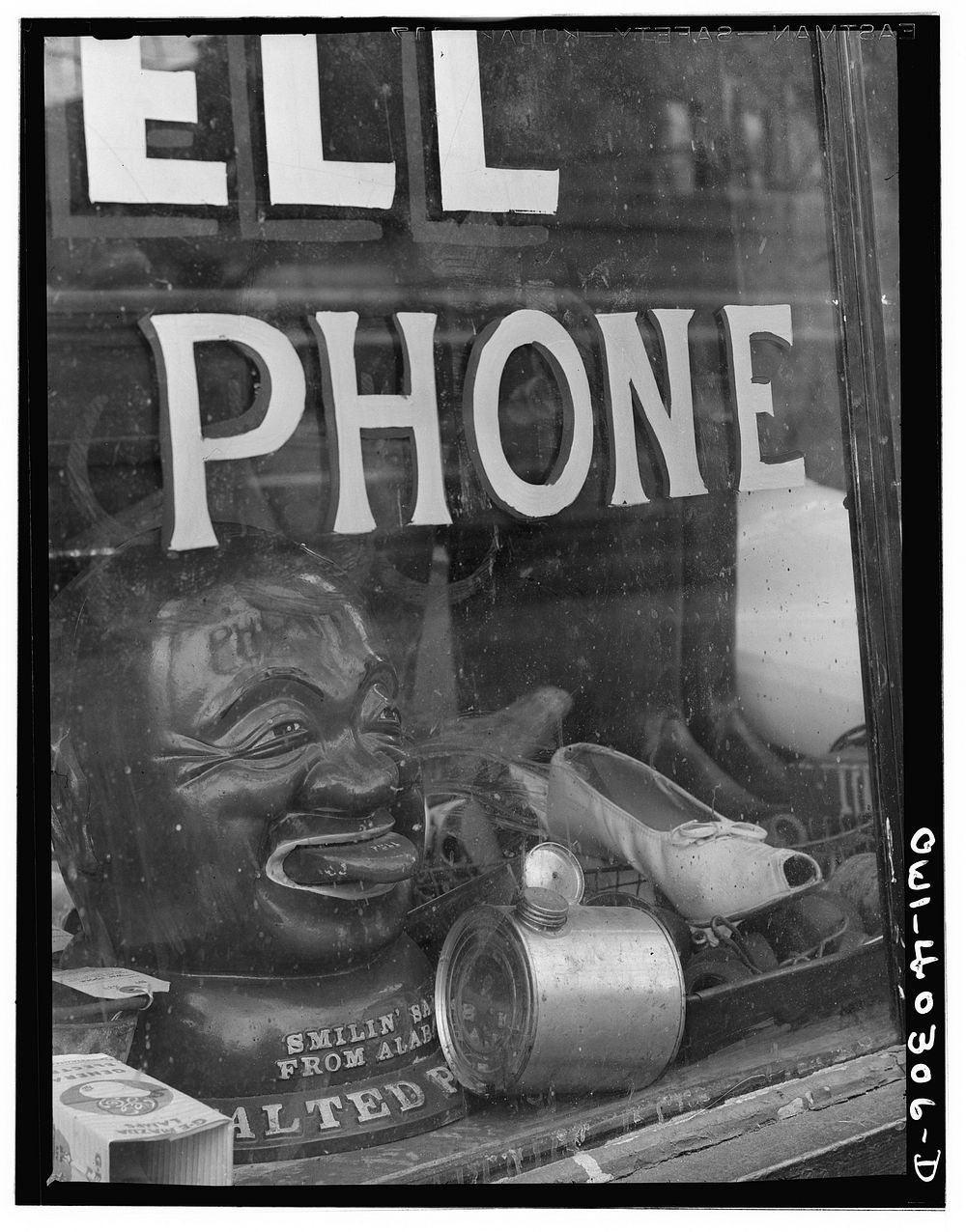 Washington, D.C. A pawnshop window. Sourced from the Library of Congress.
