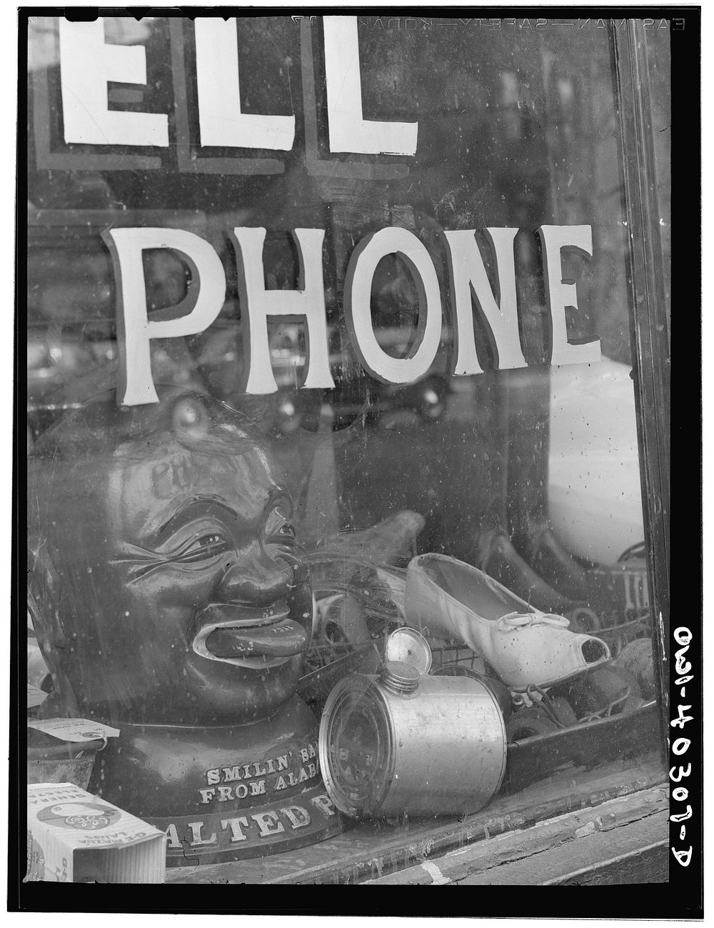 [Untitled photo, possibly related to: Washington, D.C. A pawnshop window]. Sourced from the Library of Congress.