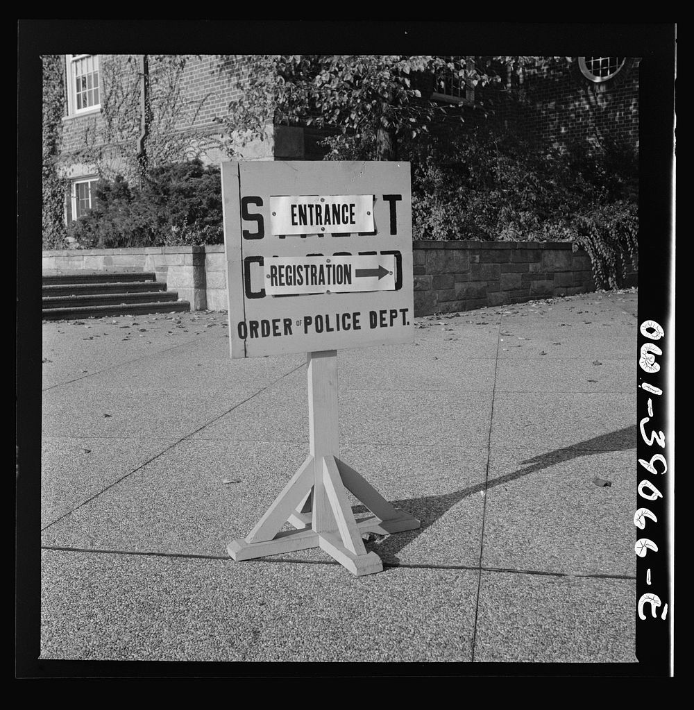 [Untitled photo, possibly related to: Washington, D.C. A sign in front of Woodrow Wilson high school on the day when number…