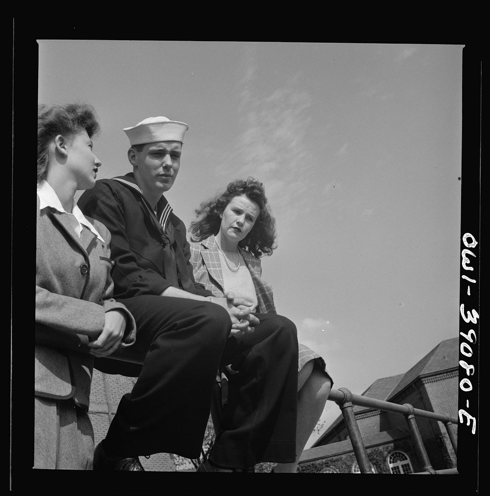Washington, D.C. A Woodrow Wilson High School student, now in the U.S. Navy, talking to a girl. Sourced from the Library of…