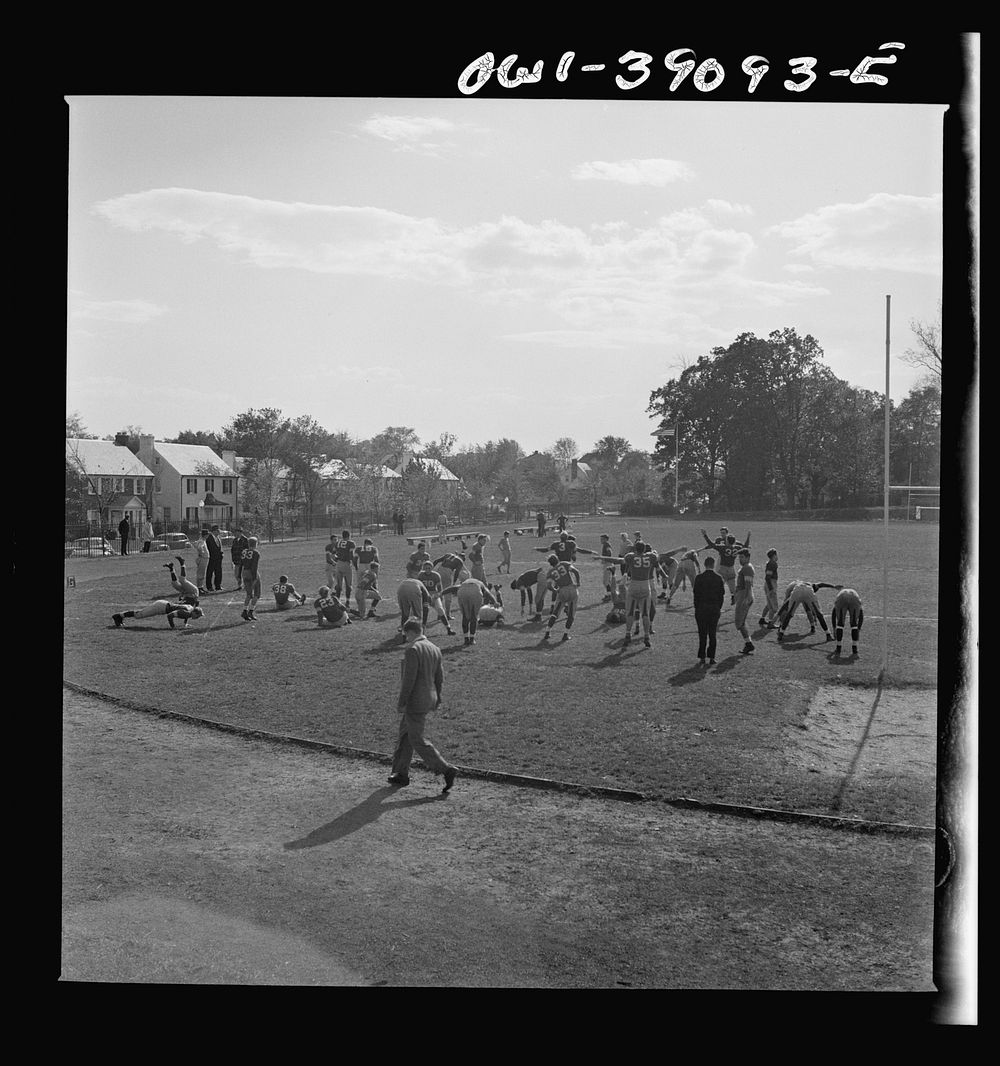 Washington, D.C. Woodrow Wilson High School football team limbering up before a game. Sourced from the Library of Congress.