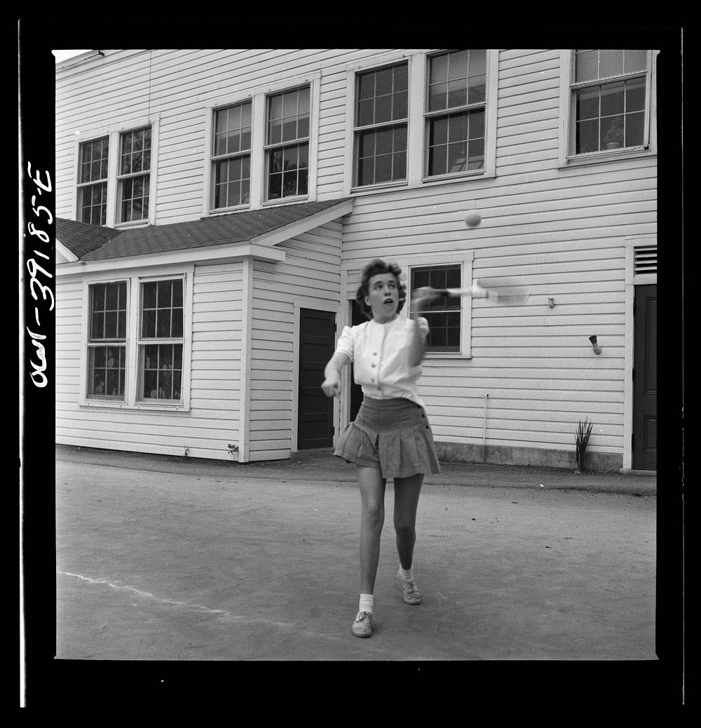 Washington, D.C. Sally Dessez, a student at Woodrow Wilson High School, playing a tennis match. Sourced from the Library of…