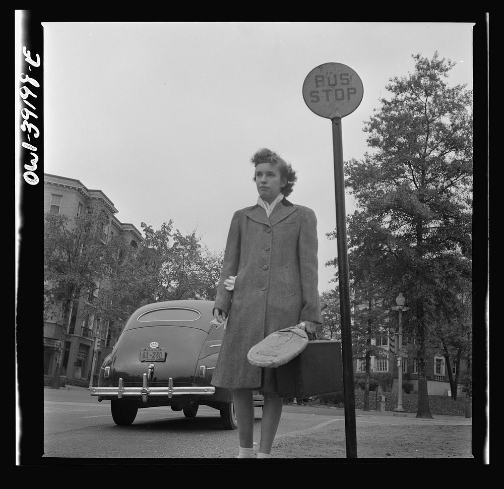 Washington, D.C. Sally Dessez, a student at Woodrow Wilson High School, waiting for a bus. From church she went to the…