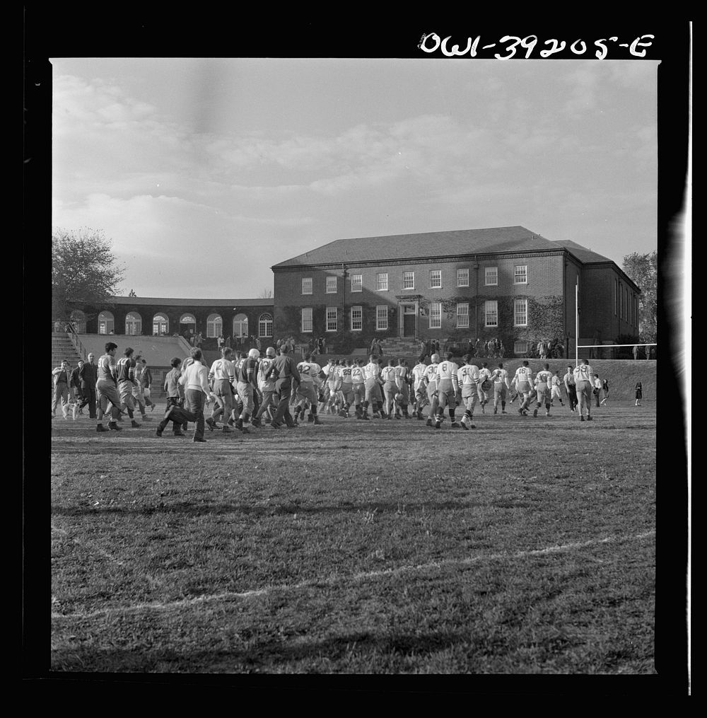 Washington, D.C. Woodrow Wilson High School team leaving the field after a game. Sourced from the Library of Congress.