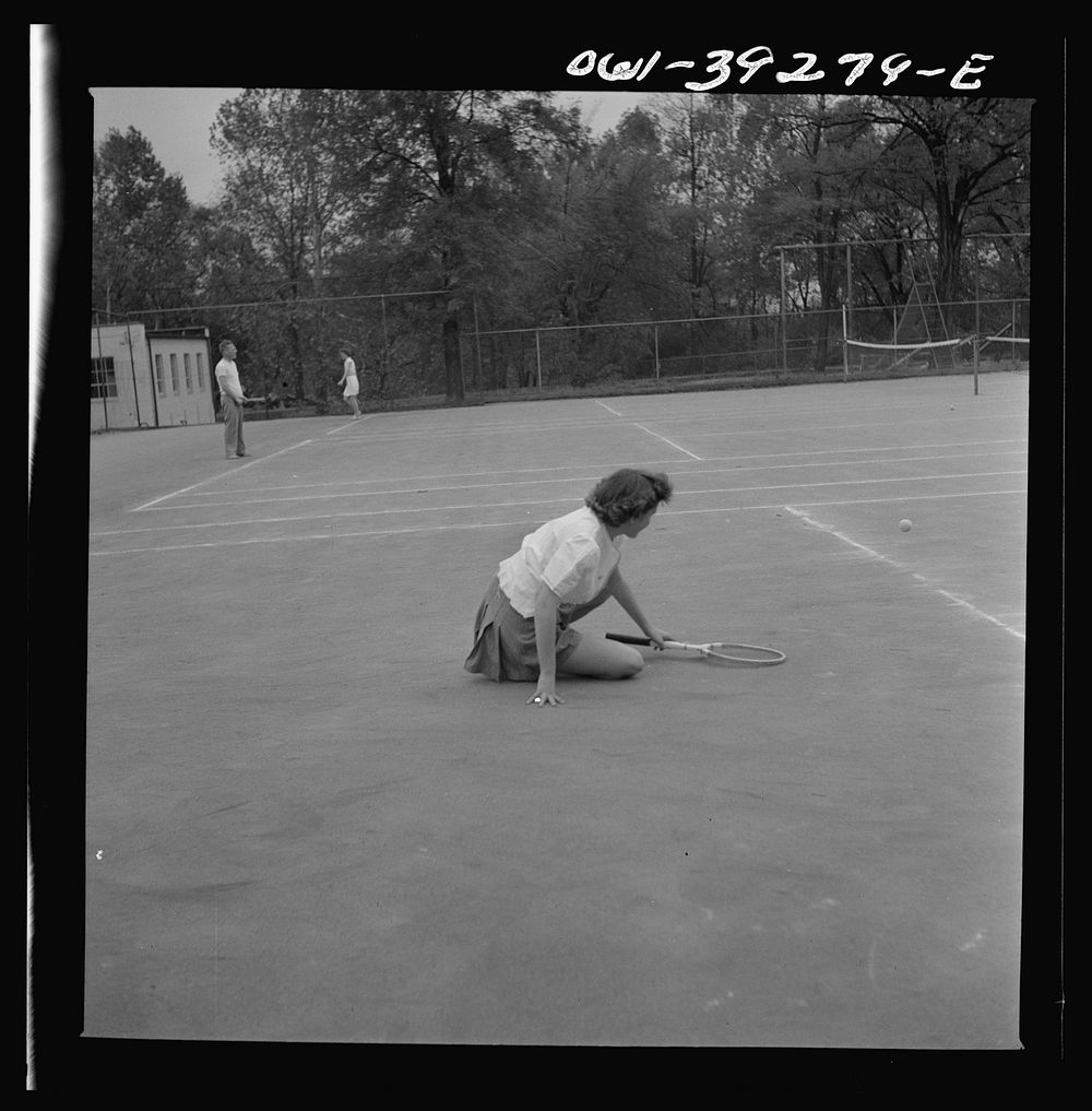 Washington, D.C. Sally Dessez, a student at Woodrow Wilson High School, playing a tennis match. Sourced from the Library of…