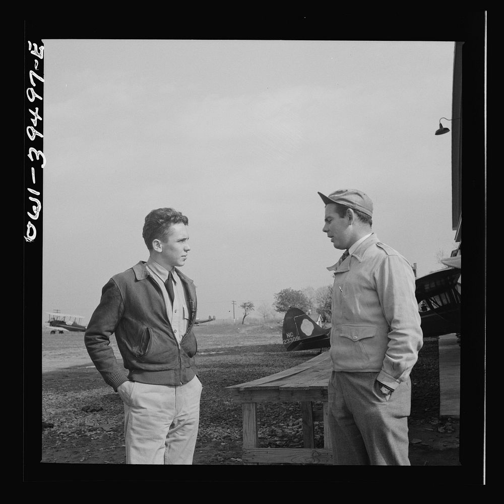 [Untitled photo, possibly related to: Frederick, Maryland. After a solo flight, Walter Spangenberg, a student at Woodrow…