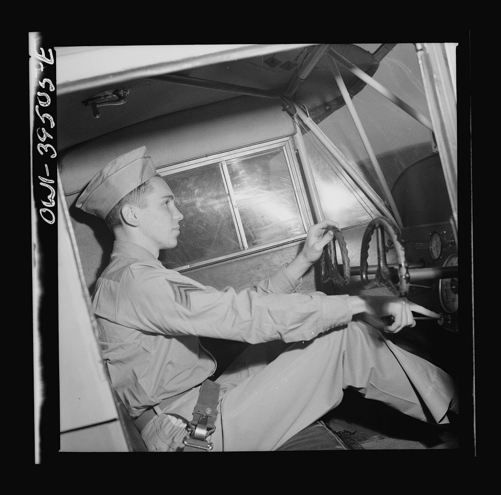 Frederick, Maryland. Walter Spangenberg, a student at Woodrow Wilson High School, in the plane in which he first soloed at…